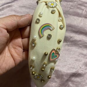 Chic Cream Headband with Floral and Rainbow Details